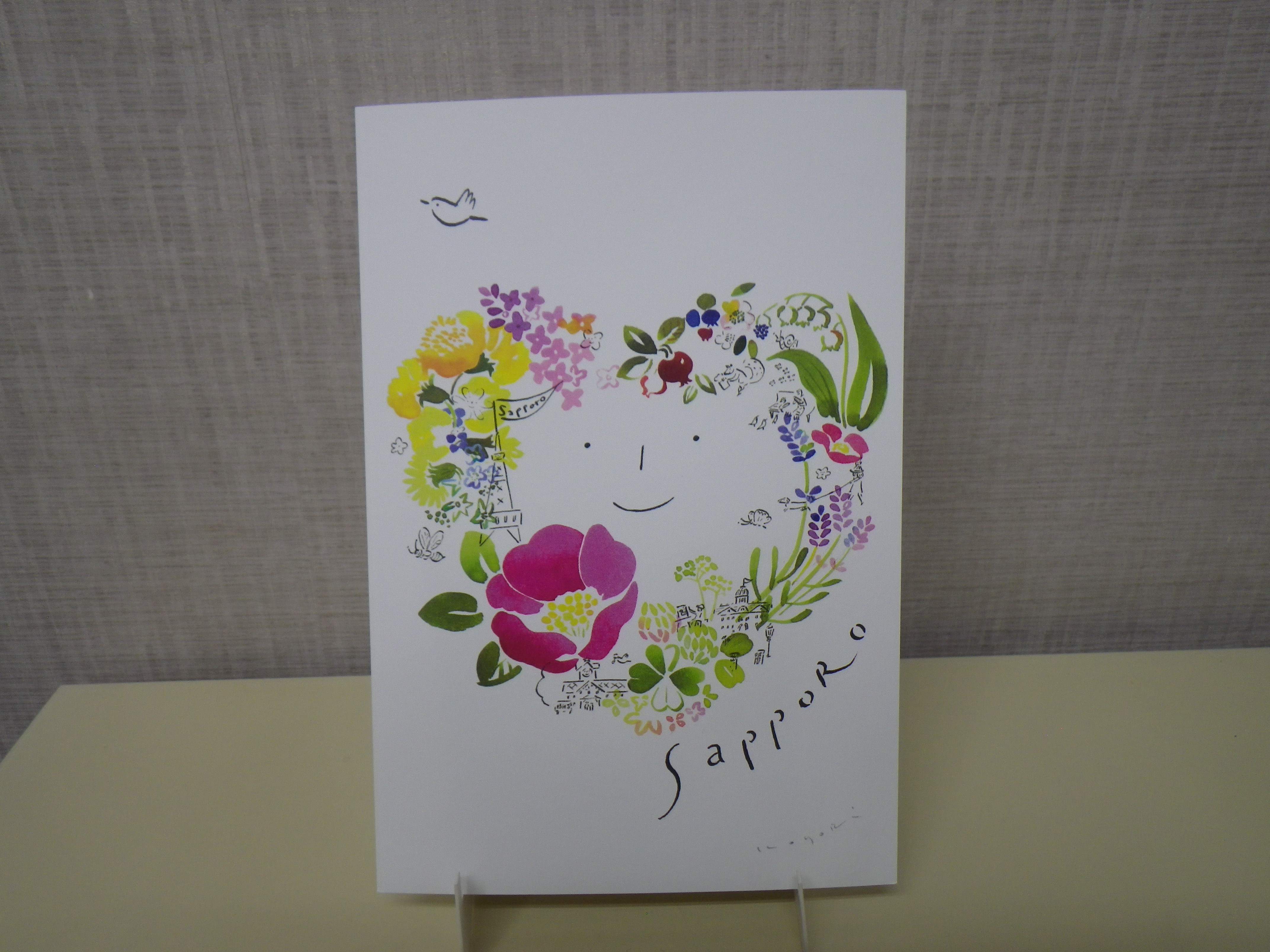 佐々木小世里さん札幌の花のリース柄のポストカードの画像